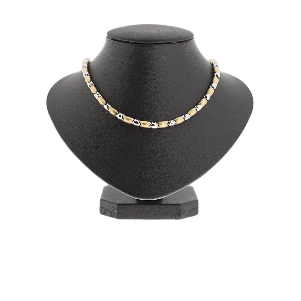 This lovely necklace offers a classy & unique look with brushed finish yellow gold beads alternating with high polished white gold beads. The necklace is comprised of 14 karat gold. It measures 15
