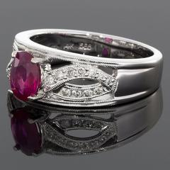 Oval Ruby Diamond White Gold Wide Twist Engagement Ring
