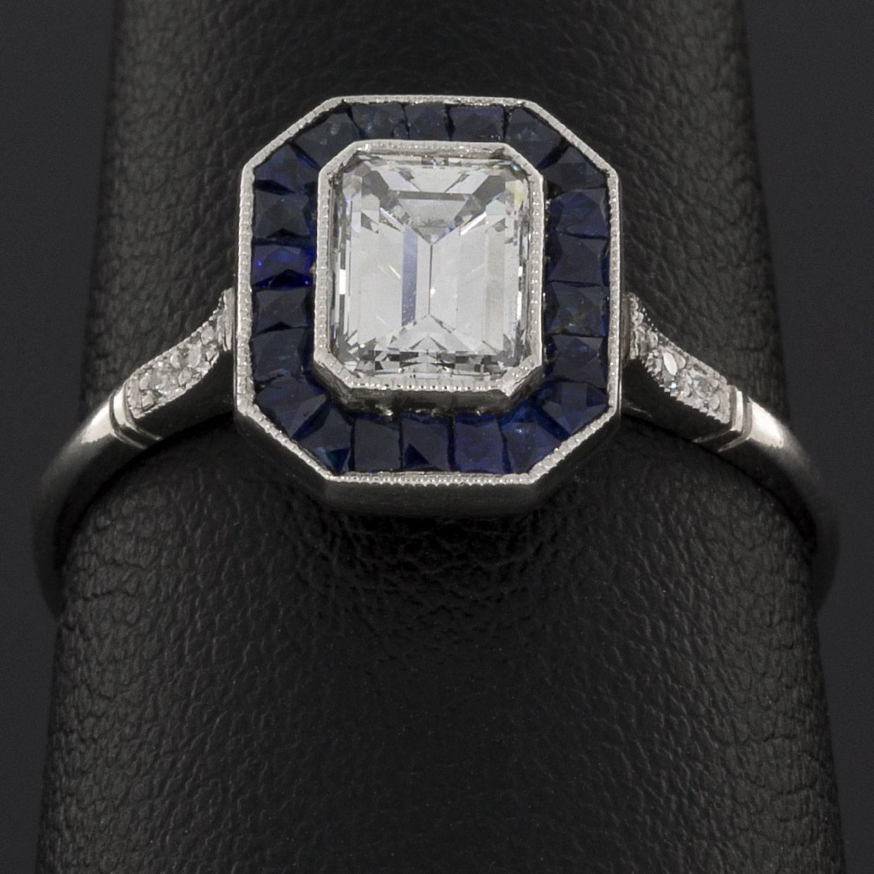 emerald cut diamond and sapphire ring