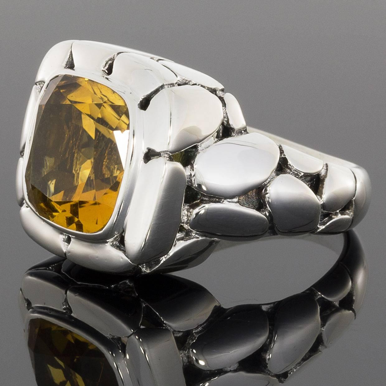 Each piece of John Hardy jewelry has been hand crafted in Bali since 1975. John Hardy is dedicated to creating timeless one-of-a-kind pieces that are brilliantly alive. This beautiful citrine ring is retired from the Batu Kali Collection. The ring