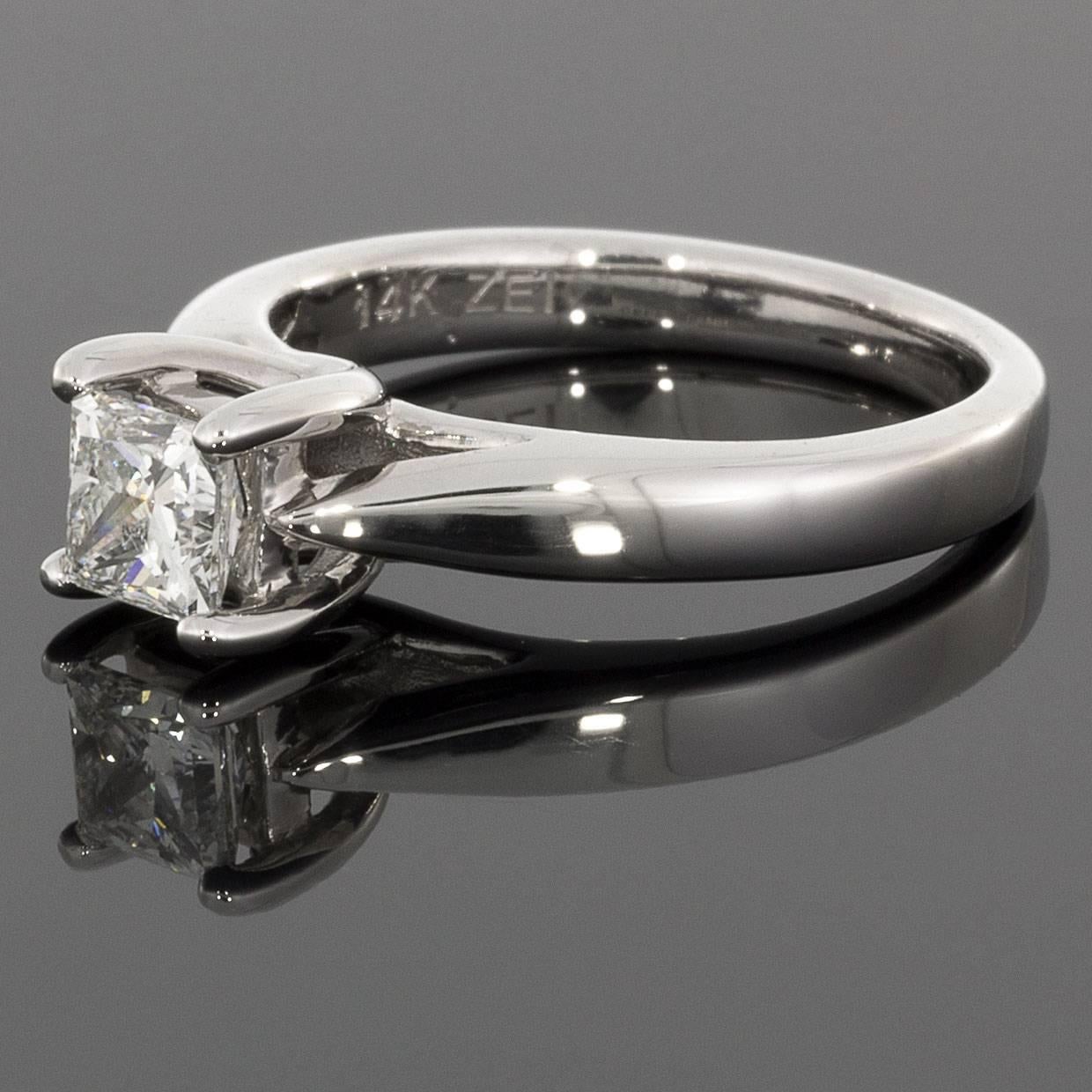 This beautiful Celebration Grand diamond engagement ring features a sparkly, brilliant princess cut diamond. This diamond weighs .50 carat & is GSL certified as G/I1 in quality. This amazing diamond is also certified ideal cut with a Light Trace