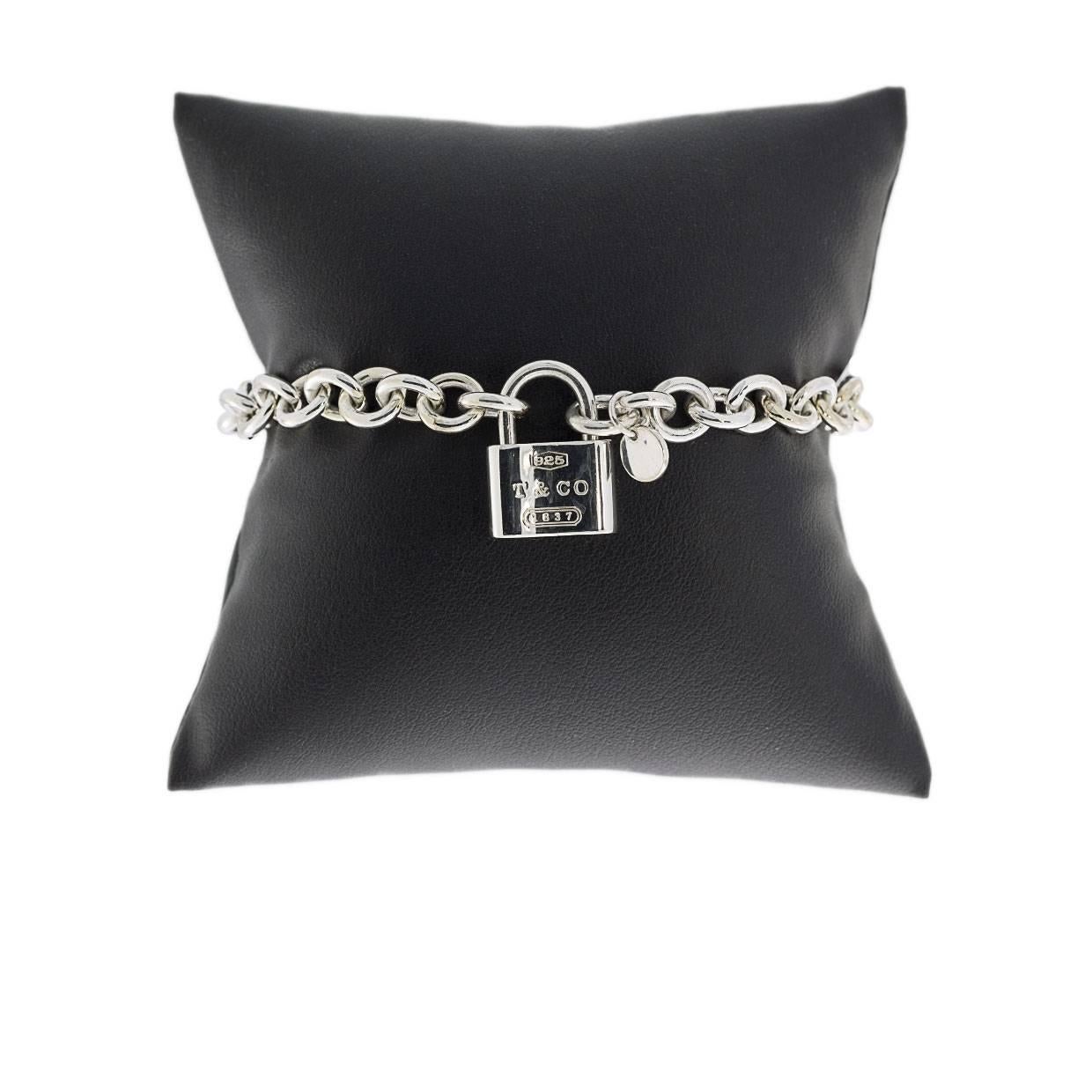 Tiffany & Co have long been revered for their fabulous diamonds & spectacular original designs that are coveted around the world. This stunning Tiffany 1837 lock bracelet is no exception! This beautiful sterling silver bracelet features a chunky