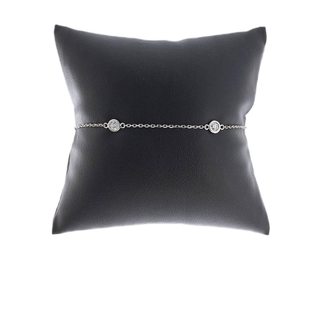 This beautiful diamond bracelet features a classic 