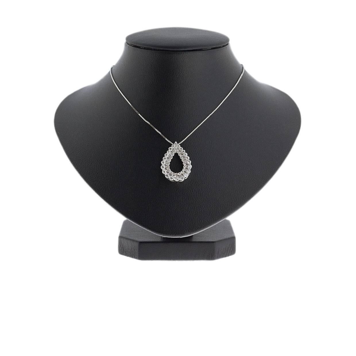 Simple yet elegant & beautiful would be the best way to describe this stunning pendant! It features sparkly round brilliant diamonds weighing 1.0 carat. The pendant is attached to an 18 karat white gold, 18