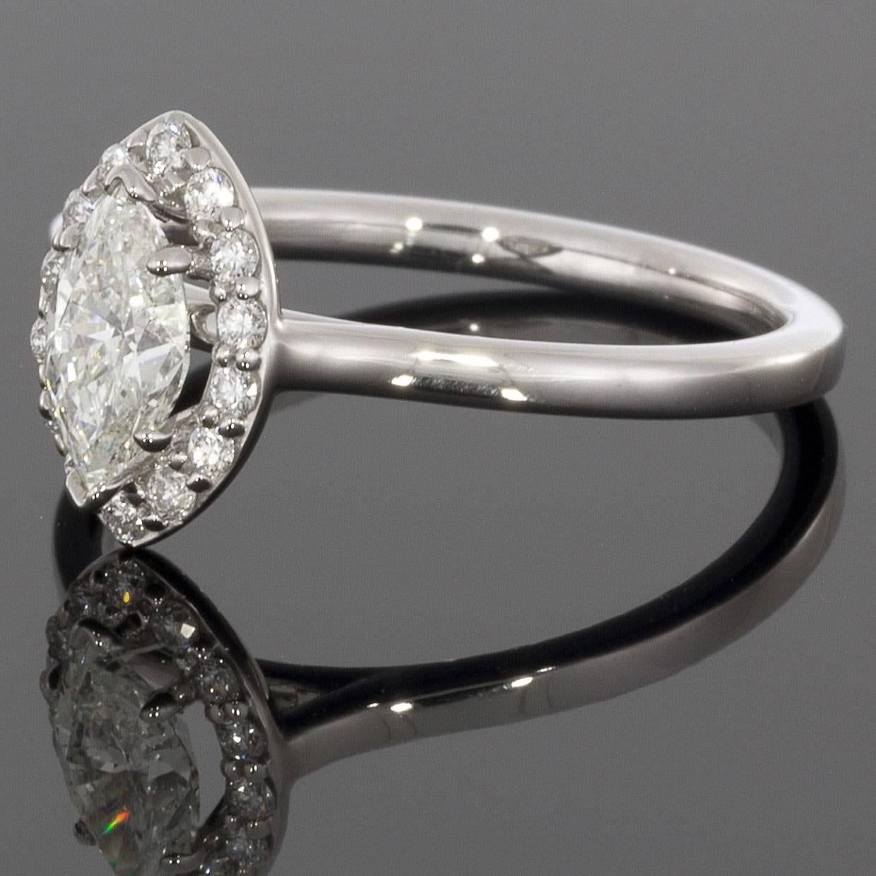 Marquise brilliant cut diamonds are a great option if you are looking for something unique that maximizes carat weight & elongates the finger. The center diamond in this beautiful engagement ring is a .57 carat marquise brilliant shape that grades