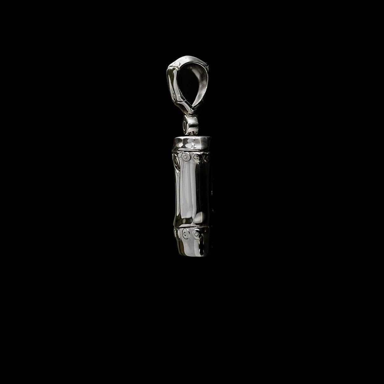 Each piece of John Hardy jewelry has been crafted in Bali since 1975. John Hardy is dedicated to creating timeless one-of-a-kind pieces that are brilliantly alive.

This sterling silver pendant is retired from John Hardy's Bamboo collection. This