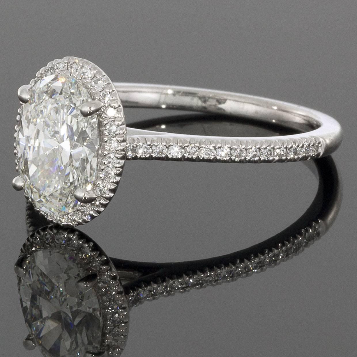 This gorgeous ring features an amazing 1.19 carat oval brilliant center diamond that is GIA certified to be H/VVS2 in quality. The ring's 54 accent diamonds have a combined total weight of .17 carat, giving the complete ring a combined total weight