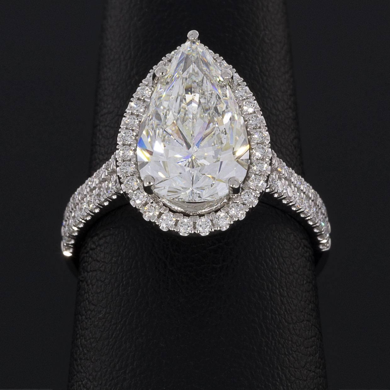 Women's 3.96 Carat Platinum Certified Pear Diamond Halo Engagement Ring For Sale