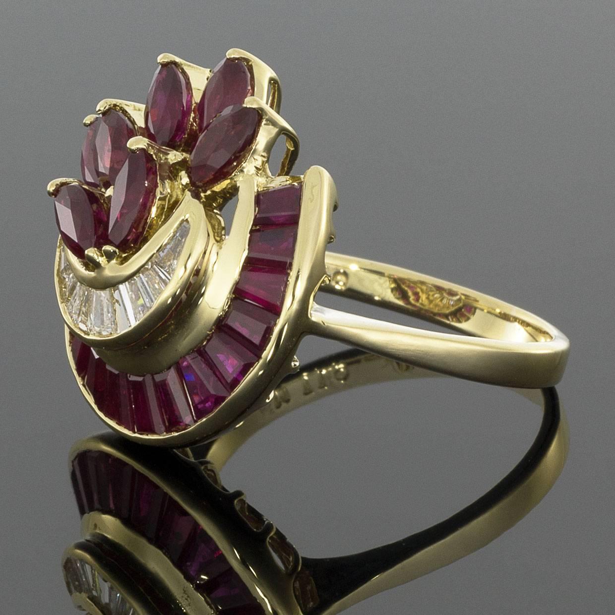This beautiful ruby ring is a unique addition to dress up any outfit! The vintage pieces features 22 marquise and tapered baguette rubies. The marquise rubies are channel set in a crescent shape. 9 tapered channel-set baguette diamonds accent the