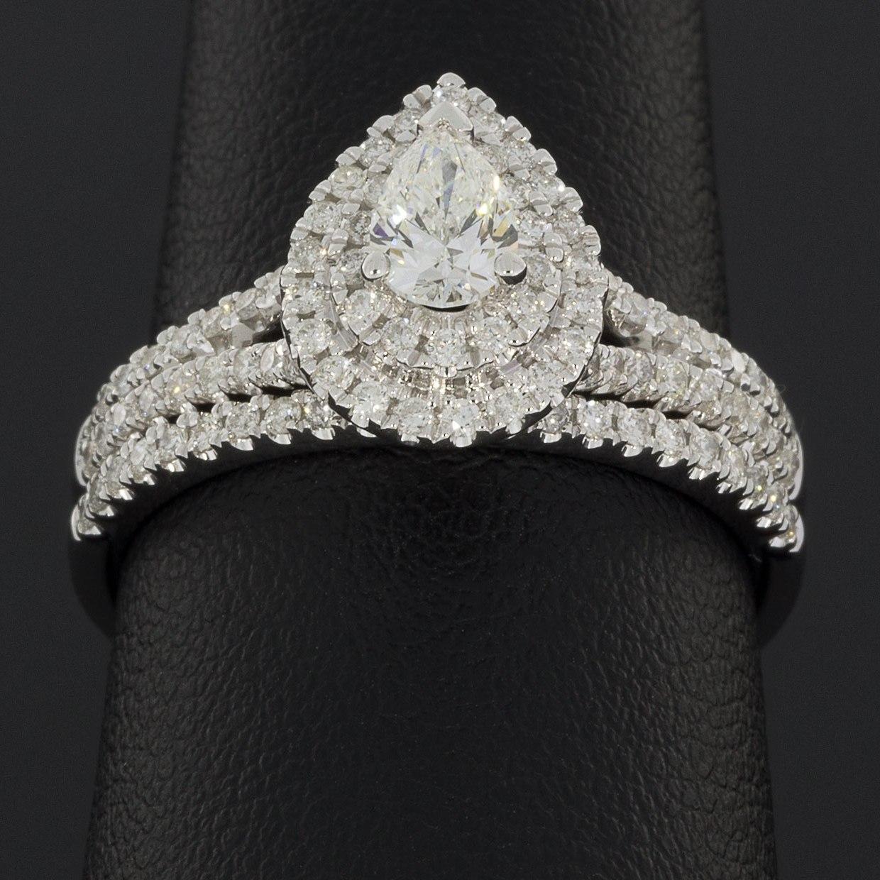 pear engagement ring with wedding band