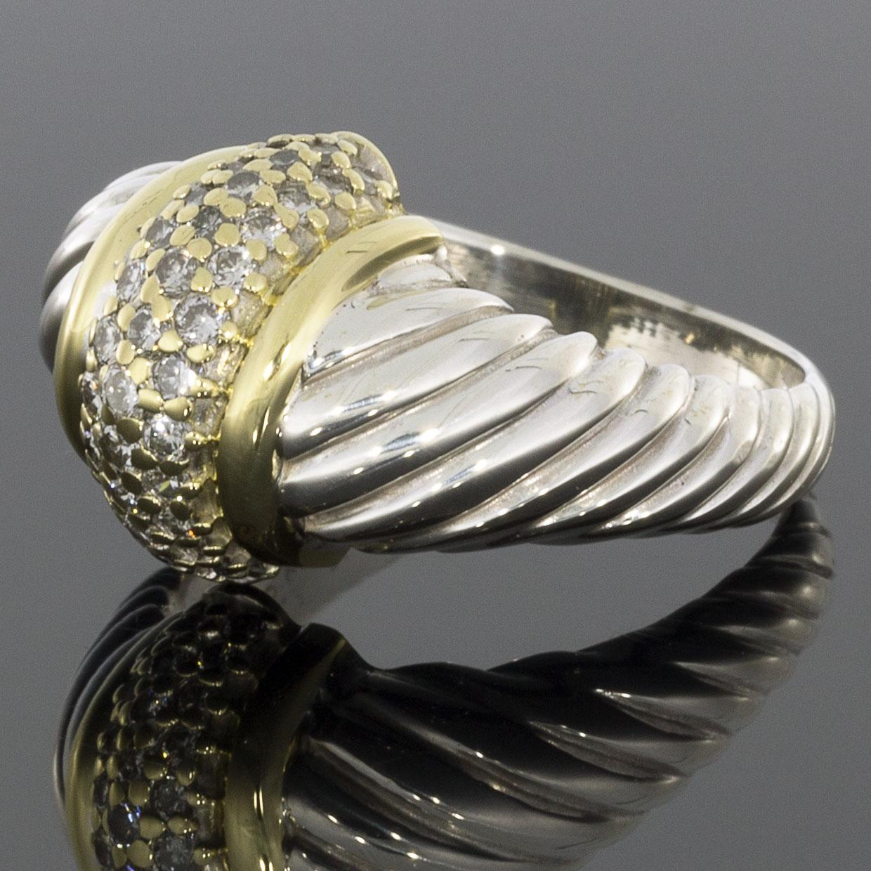 Item Details:
Estimated Retail - $795.00
Brand - David Yurman
Metal - 18 Karat Yellow Gold & 925 Sterling Silver
Total Carat Weight (TCW) - 0.57 ctw
Ring Size - 9.00
Sizable - Yes
Width - 14.30mm
Style - Band Ring

Stone 1 Information:
Stone Type -