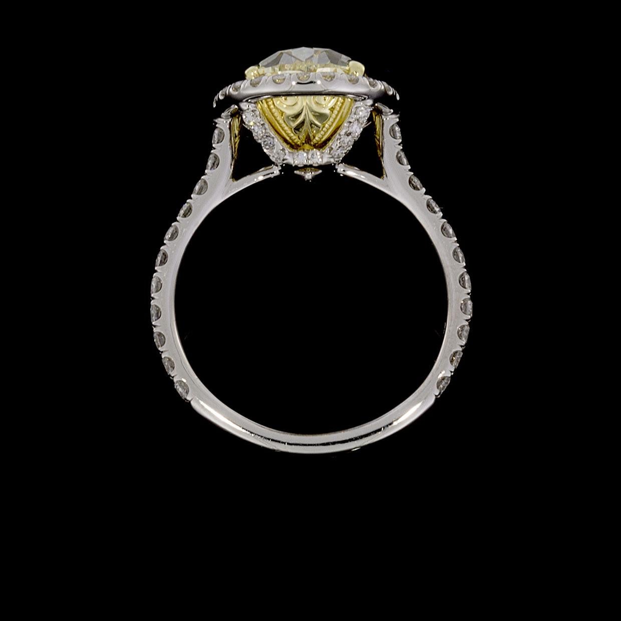 Platinum and Gold Fancy Yellow Pear Diamond EGL Certified Halo Engagement Ring In Excellent Condition In Columbia, MO