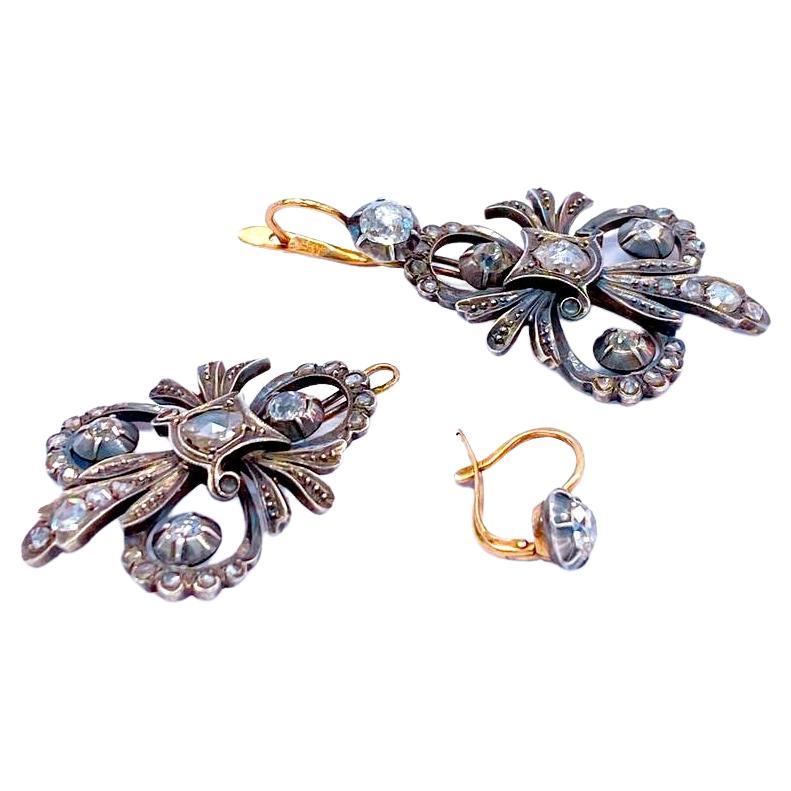 Antique 14k gold Russian diamond earrings in day-night design adjustable style made with an estimate old mine diamond and rose cut diamond weight of 2.5 carats hall marked 56 imperial Russian gold standard and initial maker mark and assay mark dates