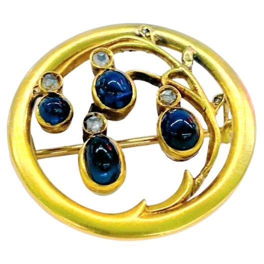 Anique Sapphire Russian Gold Brooch For Sale