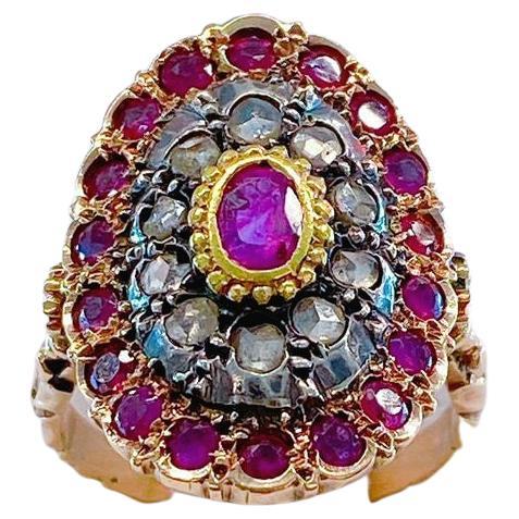 Anillo antiguo de oro con rubíes y diamantes en venta
