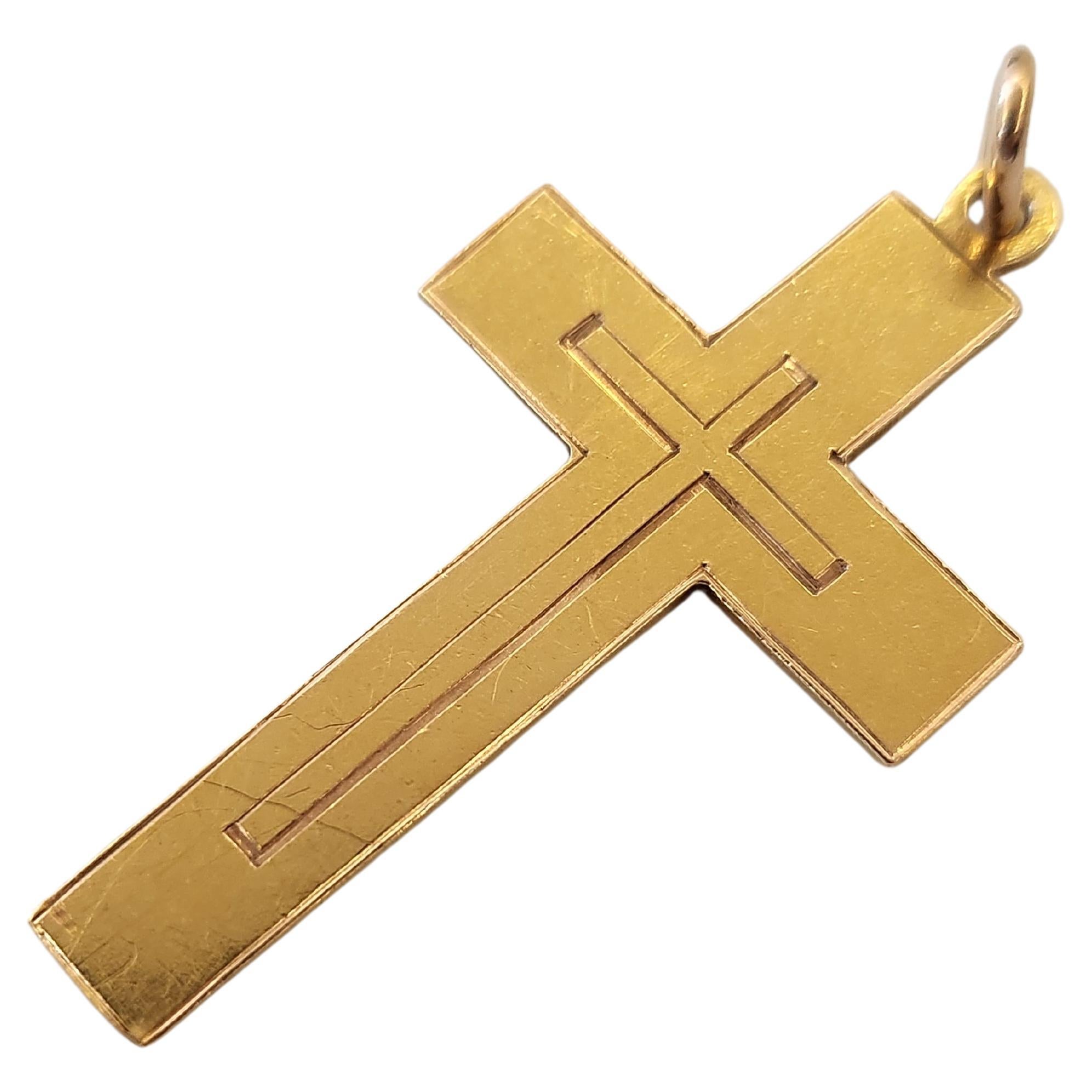 Antique russian cross pendant in 14k yellow gold ingraved on back (spaci sokrani) or save and protect cross was made in moscow 1907/1910.c imperial russian era total cross lenght is 4.5cm hall marked 56 imperial russian gold standard and moscow