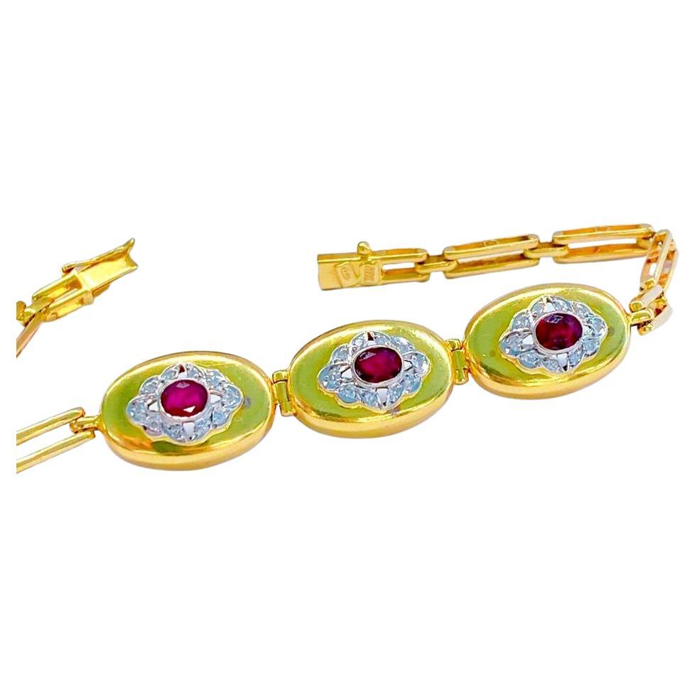 Vintage 18k yellow gold braclete centered with 3 natural rubies oval cut with a diameter of 5mm×4mm each stone  in piegion blood ruby color flanked with old cut diamonds total braclete weight 12 grams and 19cm lenght braclete is hall marked 750 for