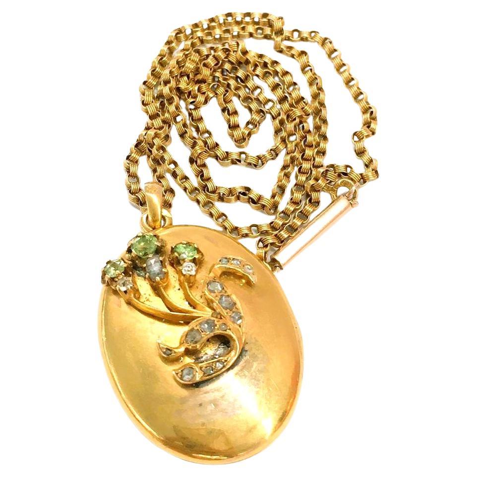 Antique 14k large locket pendant with green natural demantoid and rose cut diamonds including chain pendant was made in moscow between 1890/1910.c imperial russian era hall marked 56 imperial russian gold standard tsare head facing left and assayer