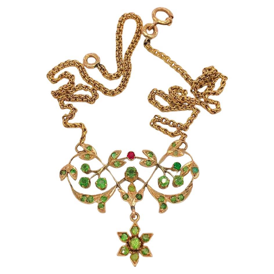 Antique 14k gold Russian necklace in artnovo style with green russian demantoid stones attached with orginal antique 14k russian chain hall marked 56 imperial russian gold standard and assay mark and initial maker mark in cyrllic alphabet 