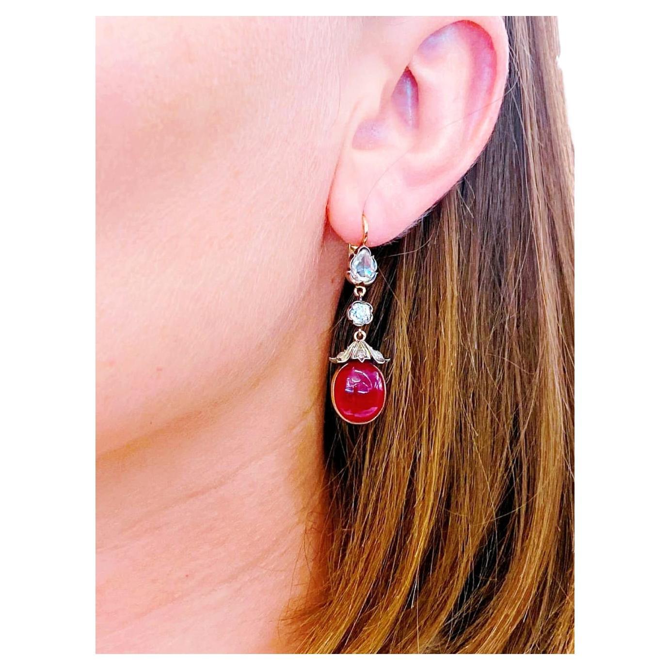 14k gold large dangling earrings with rose cut diamonds estimate weight of 2 carats and 2 natural oval cabouchon cut rubies in pegion blood colour earrings lenght 4cm 