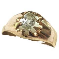 Anillo solitario de oro con diamantes talla mina antiguos