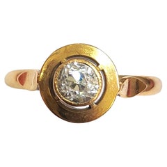Anello solitario in oro giallo con diamante antico taglio mine