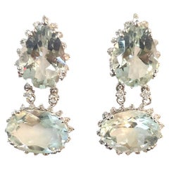 Orecchini in oro con acquamarina e diamanti a taglio brillante