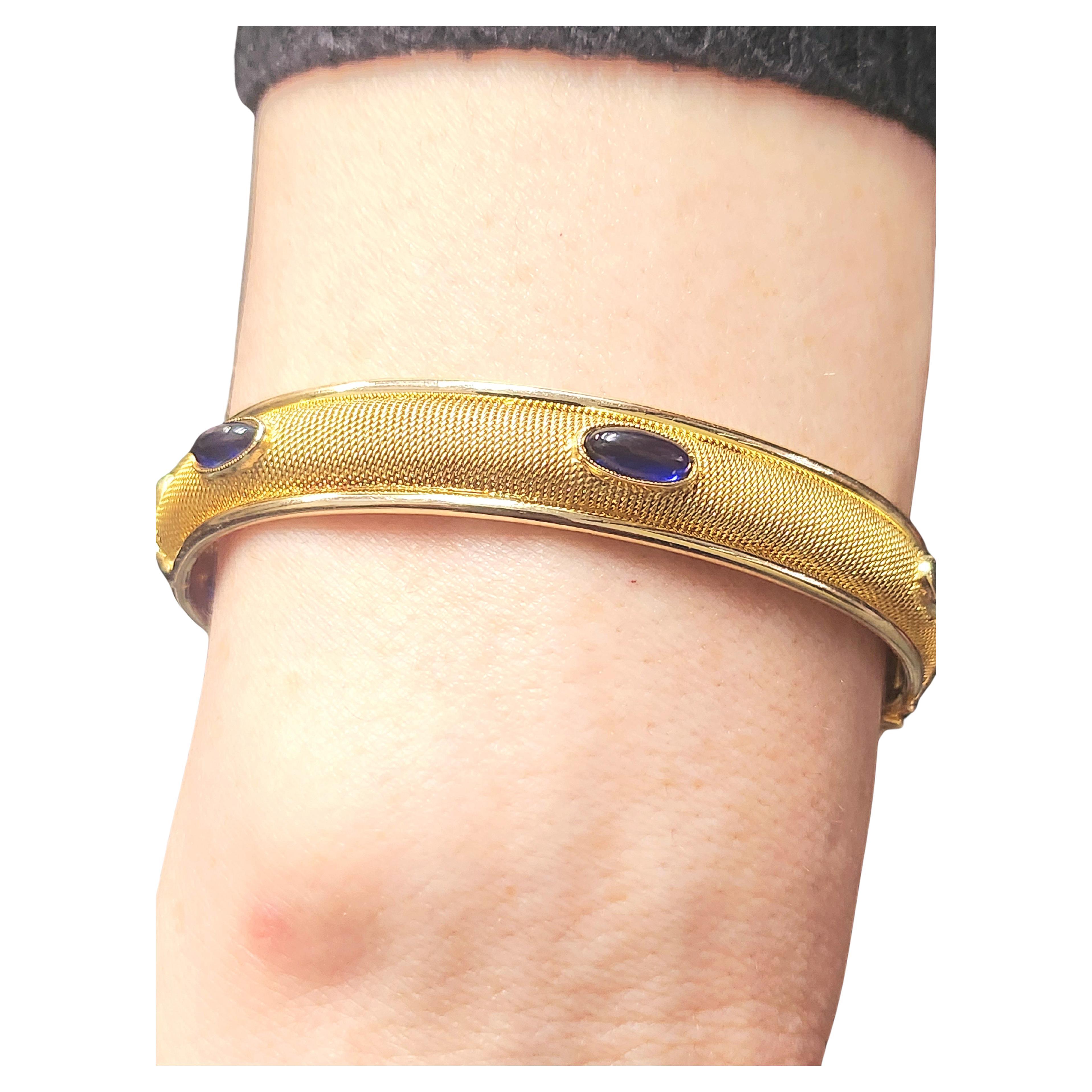Vintage italian 14k bangle bracelet with cobochon blue sapphires estimate weight 4 carats with total gold weight 16 grams hall marked 583 and initial maker mark