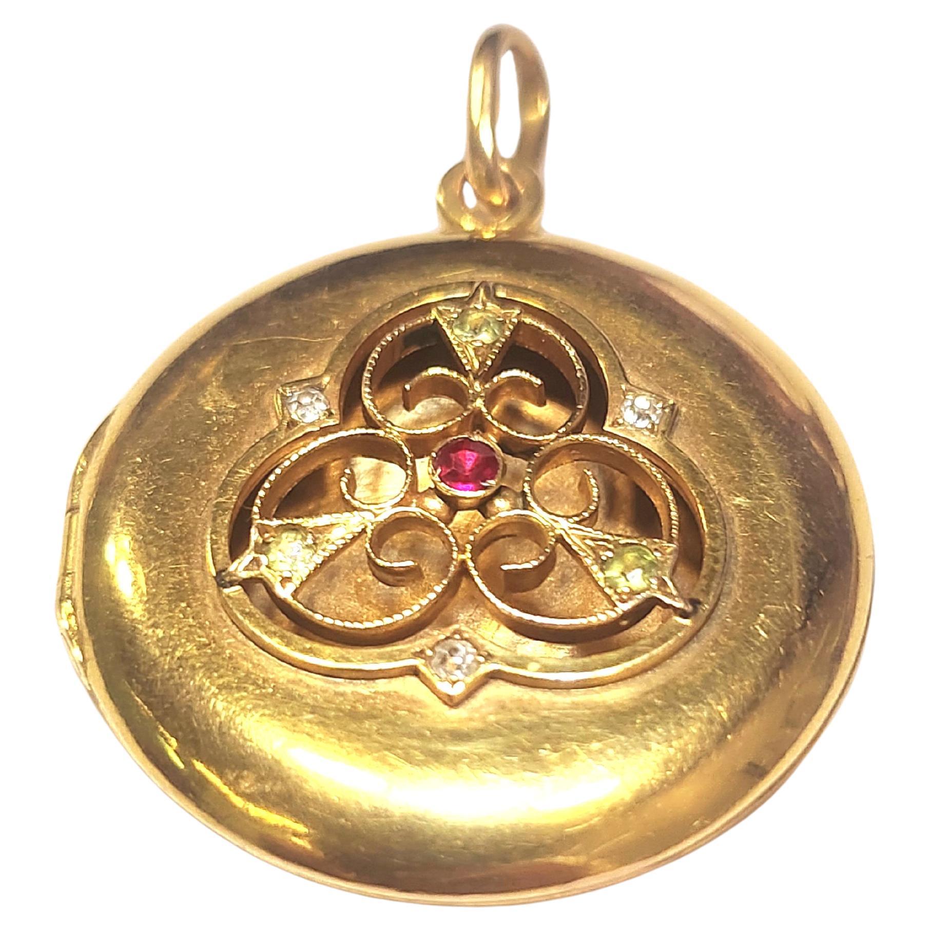Antique imperial russian era 14k gold locket pendant in open work style decorted with demantoid ruby and diamonds total locket lenght 5cm total gold weight 9 grams