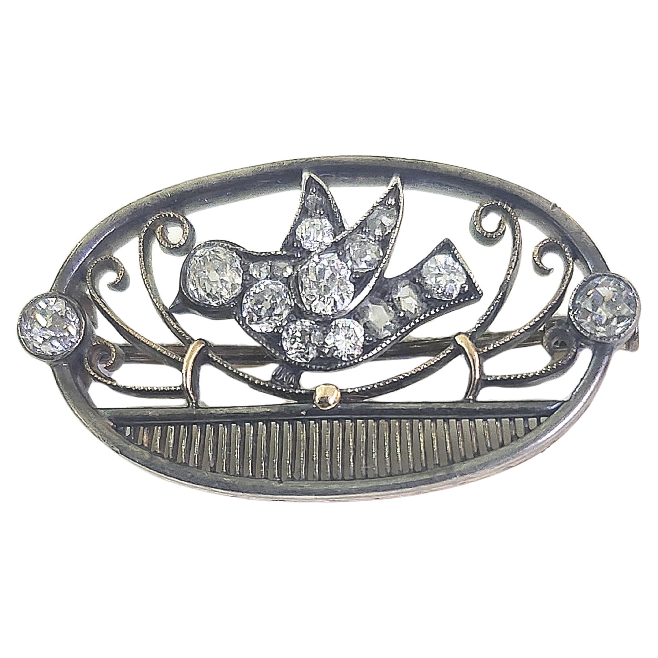 Spilla antica in oro con uccello rondine e diamanti taglio vecchio da 1 carato