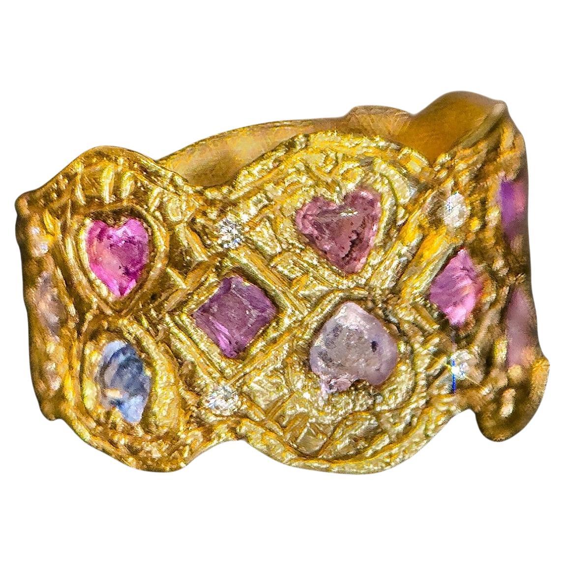 This striking large hearts ring band is a captivating fusion of circus and cubism influences, creating a unique statement piece. The design features bold, heart, square and round shapes reminiscent of cubist art, interspersed with whimsical elements