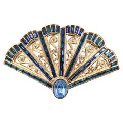 Vintage YSL Gold Tone with Blue Sapphire Crystals Fan Brooch Circa 1990s