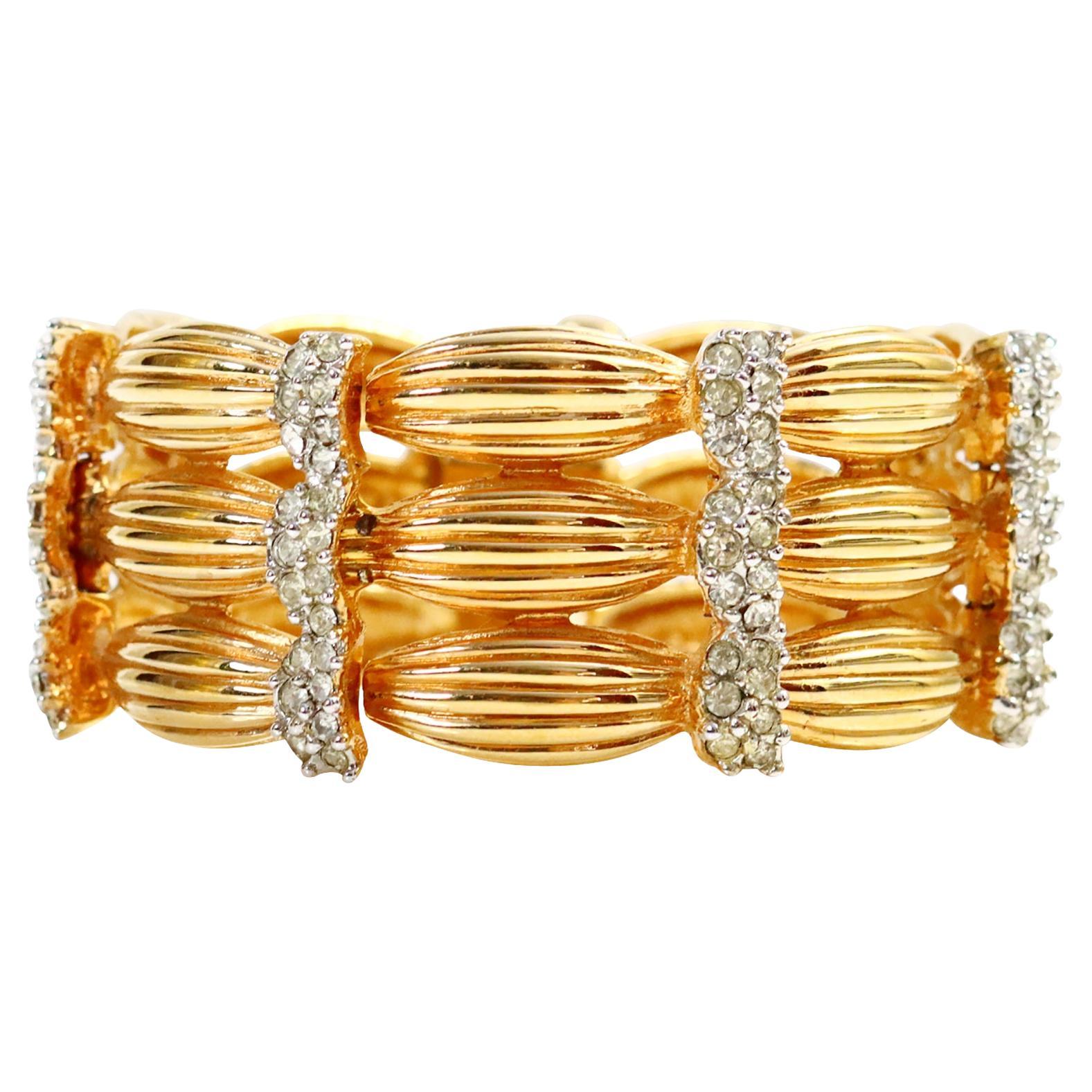 Bracciale largo vintage Boucher in oro e diamanti Circa 1960