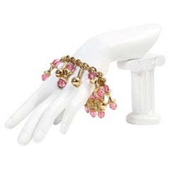 Vintage Napier Gold Tone Dangling Pink Bracelet Circa 1960s