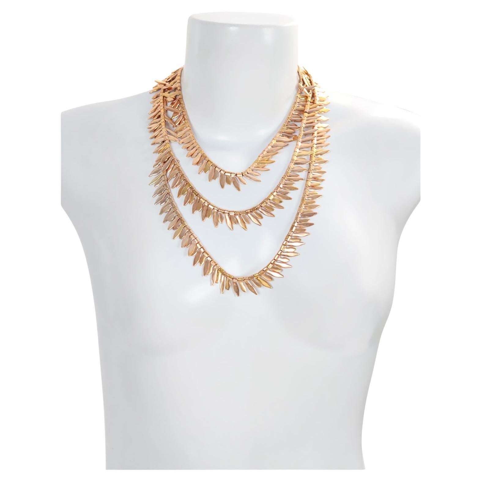 Collar largo vintage Anne Klein en tono dorado Circa años 80 en venta