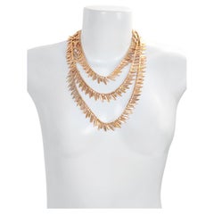 Collar largo vintage Anne Klein en tono dorado Circa años 80