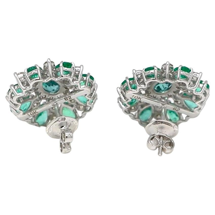 Indulge in the timeless beauty of these handcrafted Zambian Emerald & Gold Diamond Stud Earrings - a truly breathtaking addition to any jewelry collection! Each pair is crafted with meticulous attention to detail, ensuring that they are of the