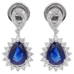 Boucles d'oreilles poire saphir bleu diamant or blanc 18 carats