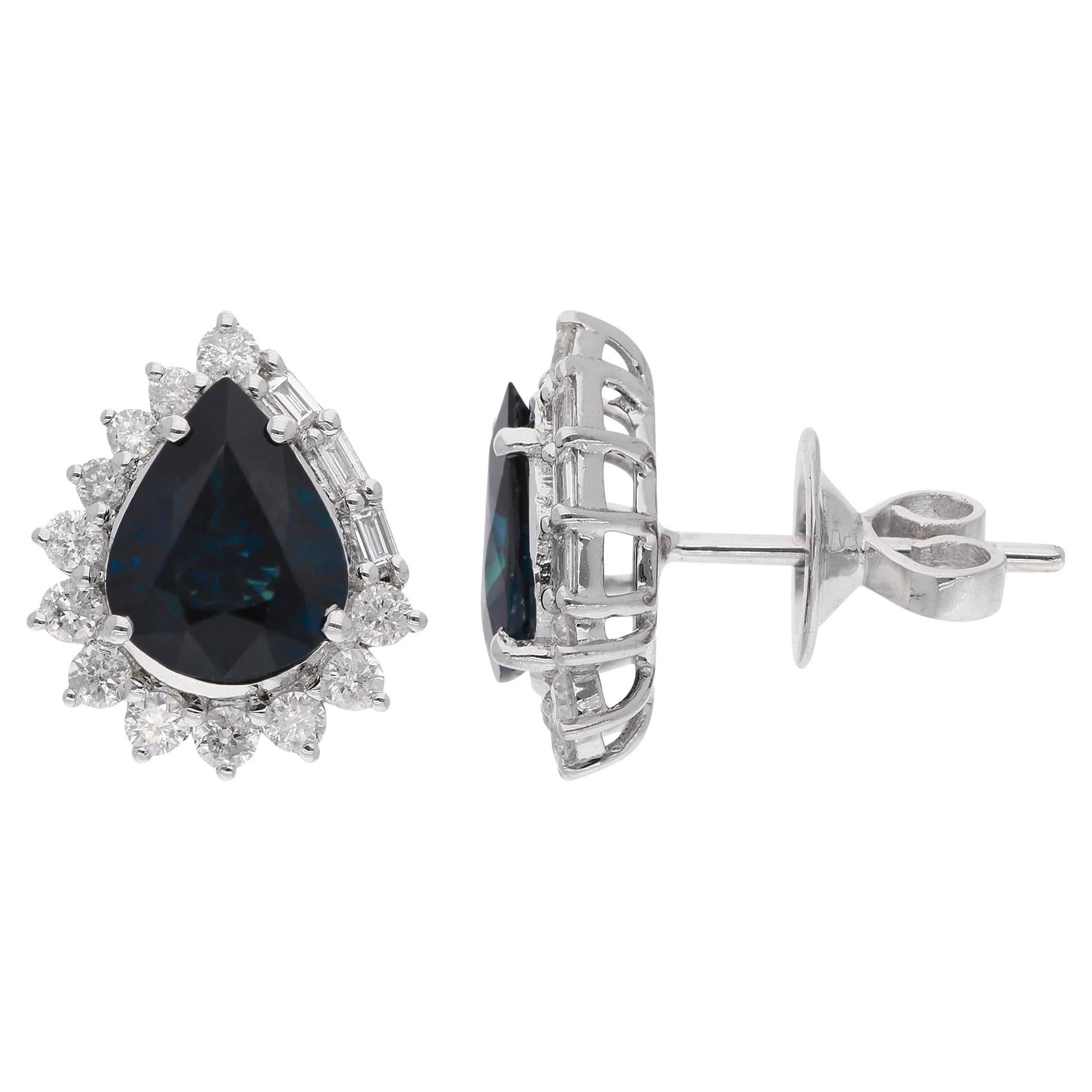 Clous d
oreilles en or blanc 14 carats avec saphir bleu poire et diamants