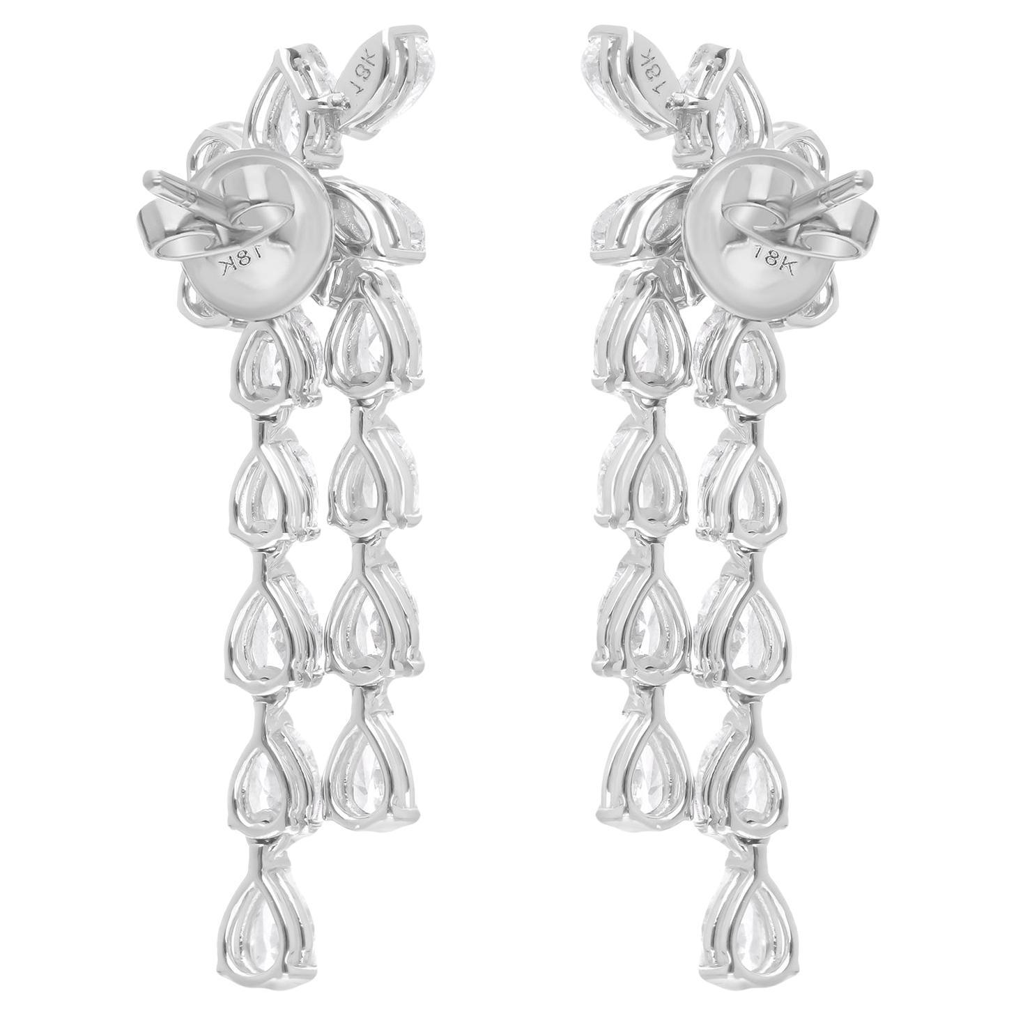Realizzati con la massima precisione e attenzione ai dettagli, questi orecchini sono la testimonianza di un'artigianalità raffinata e di una qualità eccezionale. La montatura in oro bianco da 18 carati aggiunge un tocco di raffinatezza, fornendo lo