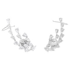 Boucles d
oreilles manchette en or blanc 14 carats avec diamants poire de 3,4 carats de pureté SI de couleur hi-colore