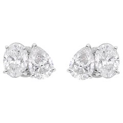 Boucles d
oreilles en or blanc 18 carats avec diamants ovales et poire de couleur SI Clarity HI