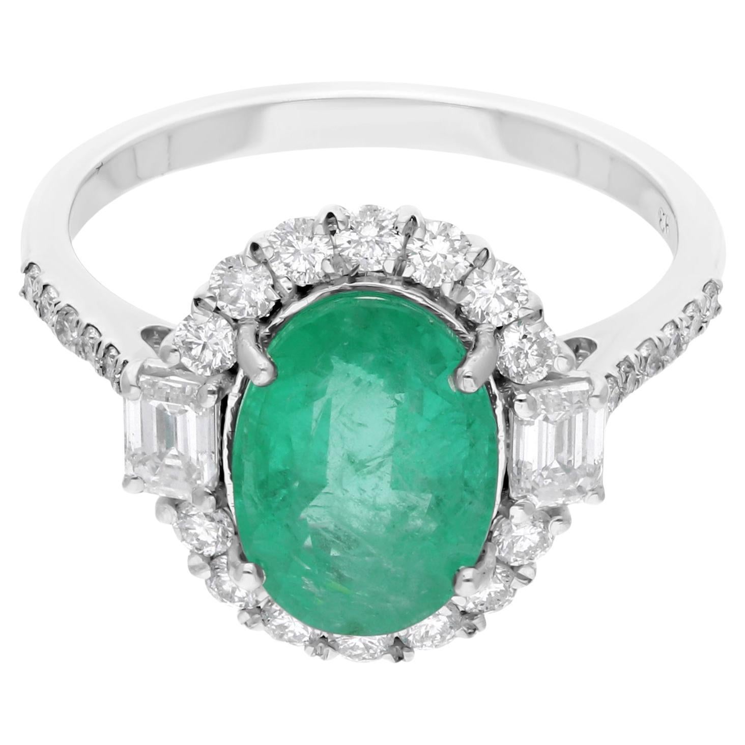 Anello con smeraldo dello Zambia di forma ovale, purezza SI, colore HI, diamante, oro bianco 14 kt.