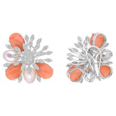 Boucles d
oreilles Corail Nacre Diamant SI/H Or blanc 14 carats