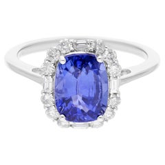 Bague en or blanc 14 carats avec saphir bleu 3,52 carats et diamants SI/H