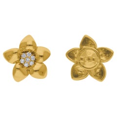 Boucles d
oreilles fleur en or jaune 14 carats avec diamants de 0,17 carat de pureté SI de couleur hi-colore