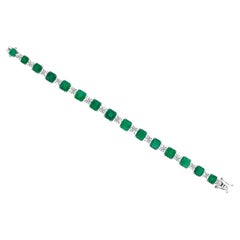 27,38 TCW Bracciale tennis con smeraldi naturali taglio smeraldo e diamanti in oro bianco 18 carati