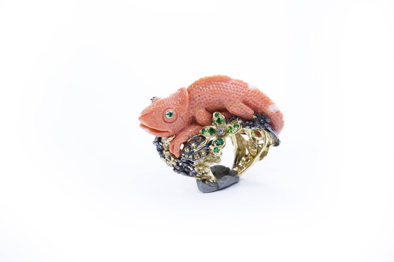 Coral Chameleon Sculpture Ring.
18kt Gold
Handmade unique piece.
Natural Stones, not treated.
Gold Gr 19,8
Brow Diamonds Kt 0,48
Yellow Sapphires Kt 0,25
Tsavorites Kt1,54
Coral Chameleon Gr 13,10