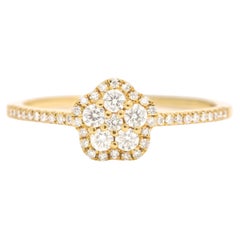 Diamante natural 0,32 quilates Anillo de compromiso en racimo floral de oro amarillo de 18 quilates
