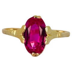 14k yellow gold ring 14 carat with oval pink sapphire of 1.76 carat